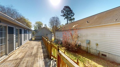 Well-maintained 3-bedroom, 2-bath home located in the gated - photo 3