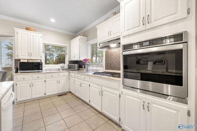 Experience exceptional waterfront living in this full brick - photo 12