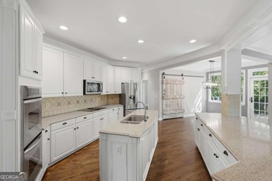 This stunning 6-bedroom, 5-bathroom riverfront home offers the - photo 13