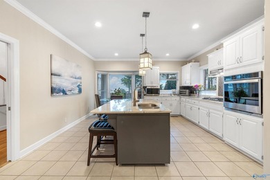 Experience exceptional waterfront living in this full brick - photo 13
