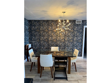 Wake up to breathtaking, unobstructed Intracoastal and Miami