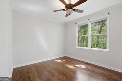 This stunning 6-bedroom, 5-bathroom riverfront home offers the - photo 20