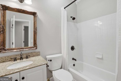 This stunning 6-bedroom, 5-bathroom riverfront home offers the - photo 21