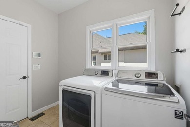 This stunning 6-bedroom, 5-bathroom riverfront home offers the - photo 22