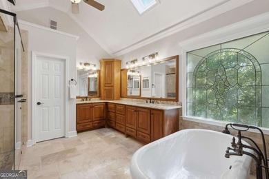 This stunning 6-bedroom, 5-bathroom riverfront home offers the - photo 26