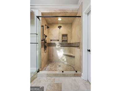 This stunning 6-bedroom, 5-bathroom riverfront home offers the - photo 27