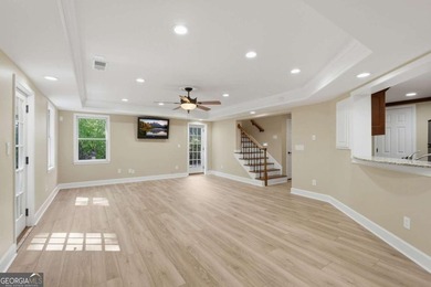 This stunning 6-bedroom, 5-bathroom riverfront home offers the - photo 38