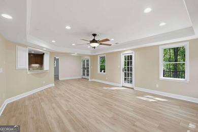 This stunning 6-bedroom, 5-bathroom riverfront home offers the - photo 40