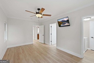 This stunning 6-bedroom, 5-bathroom riverfront home offers the - photo 42
