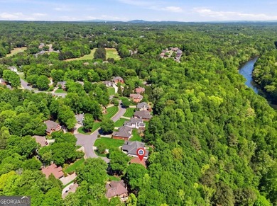 This stunning 6-bedroom, 5-bathroom riverfront home offers the - photo 55