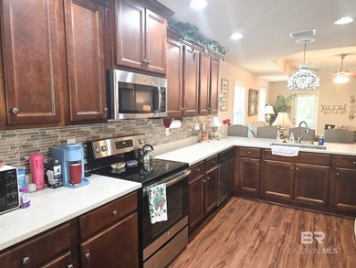 This amazingly PRICED HOME IN IBERVILLE SQUARE is a WELL - photo 11