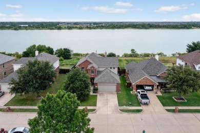 Beautiful lakefront home with lots of upgrades! Backyard - Lake Home For Sale in Little Elm, Texas