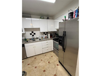 Experience the best of Miami Beach living in this beautifully