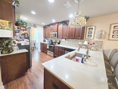 This amazingly PRICED HOME IN IBERVILLE SQUARE is a WELL - photo 14