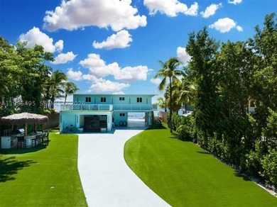 Experience true oceanfront living in the Florida Keys with this - photo 1