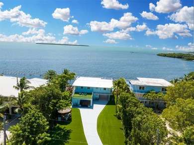 Experience true oceanfront living in the Florida Keys with this - photo 2