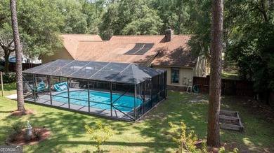 RELAX POOLSIDE IN YOUR OWN PRIVATE BACKYARD OASIS! This - photo 4