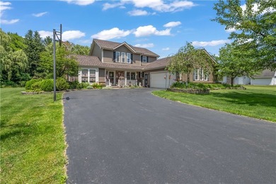 Nestled on a 1.34-acre lot in Webster, this spacious 5-bedroom - photo 1