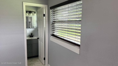 Beautifully remodeled concrete block 4/2 home with a new metal - photo 11
