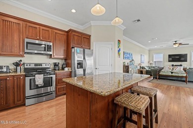Welcome to refined coastal living in this custom-built - photo 13