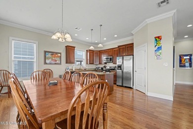 Welcome to refined coastal living in this custom-built - photo 15