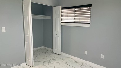 Beautifully remodeled concrete block 4/2 home with a new metal - photo 15