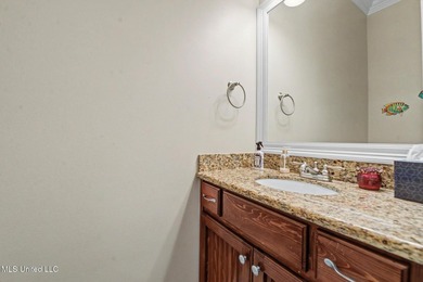 Welcome to refined coastal living in this custom-built - photo 16