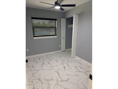 Beautifully remodeled concrete block 4/2 home with a new metal - photo 16