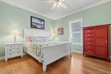 Welcome to refined coastal living in this custom-built - photo 17