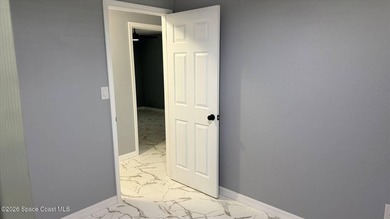 Beautifully remodeled concrete block 4/2 home with a new metal - photo 17