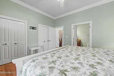 Welcome to refined coastal living in this custom-built - photo 18