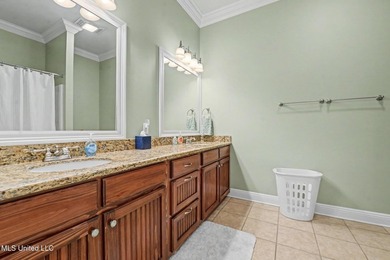 Welcome to refined coastal living in this custom-built - photo 19
