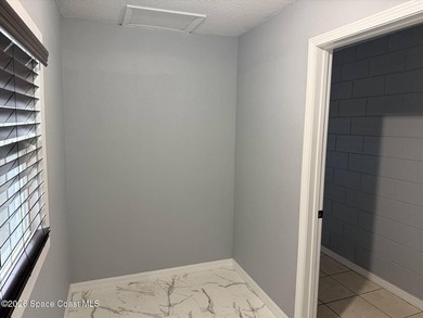 Beautifully remodeled concrete block 4/2 home with a new metal - photo 20