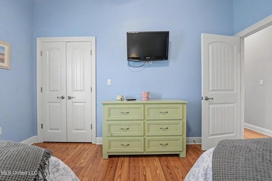 Welcome to refined coastal living in this custom-built - photo 21