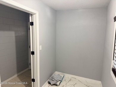Beautifully remodeled concrete block 4/2 home with a new metal - photo 21