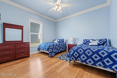 Welcome to refined coastal living in this custom-built - photo 22