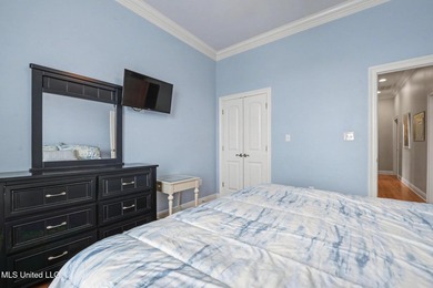 Welcome to refined coastal living in this custom-built - photo 25