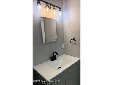 Beautifully remodeled concrete block 4/2 home with a new metal - photo 25