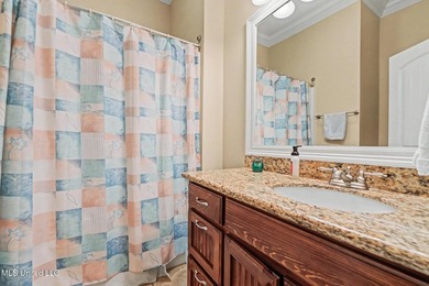 Welcome to refined coastal living in this custom-built - photo 26