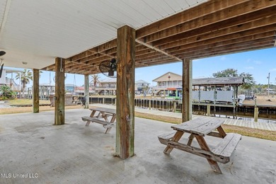 Welcome to refined coastal living in this custom-built - photo 28