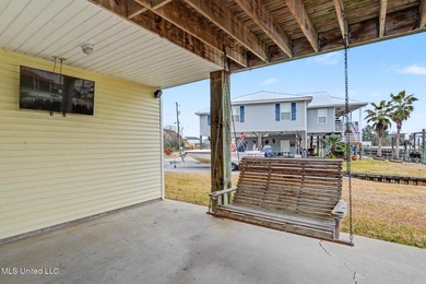 Welcome to refined coastal living in this custom-built - photo 29
