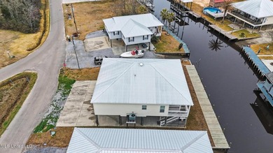 Welcome to refined coastal living in this custom-built - photo 34