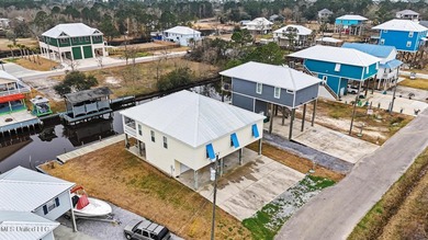 Welcome to refined coastal living in this custom-built - photo 36