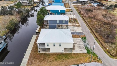 Welcome to refined coastal living in this custom-built - photo 37