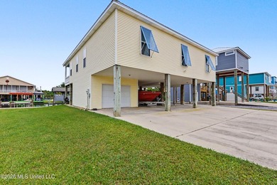 Welcome to refined coastal living in this custom-built - photo 38