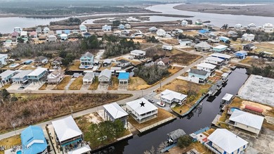 Welcome to refined coastal living in this custom-built - photo 42