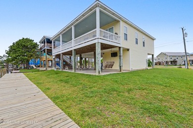 Welcome to refined coastal living in this custom-built - photo 45
