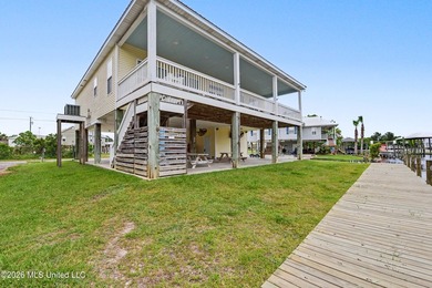 Welcome to refined coastal living in this custom-built - photo 46