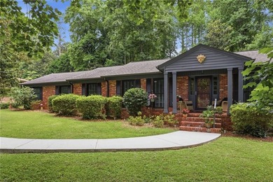 FLAWLESSLY updated 4 sided brick ranch on a GORGEOUS level lot - photo 2