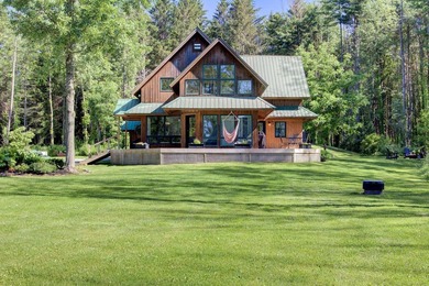 Set along the scenic west shore of South Hero among upscale - photo 1